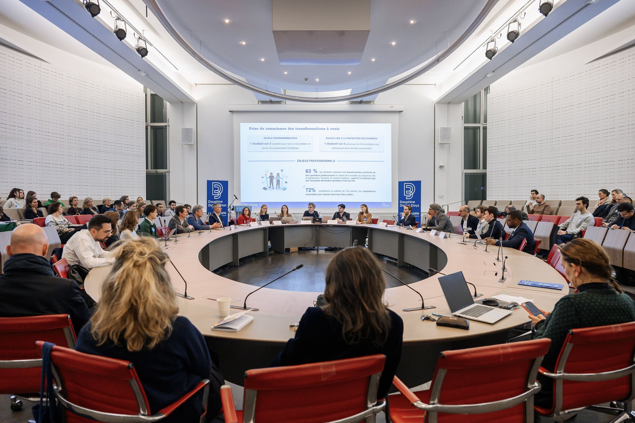 Team member working on a laptop